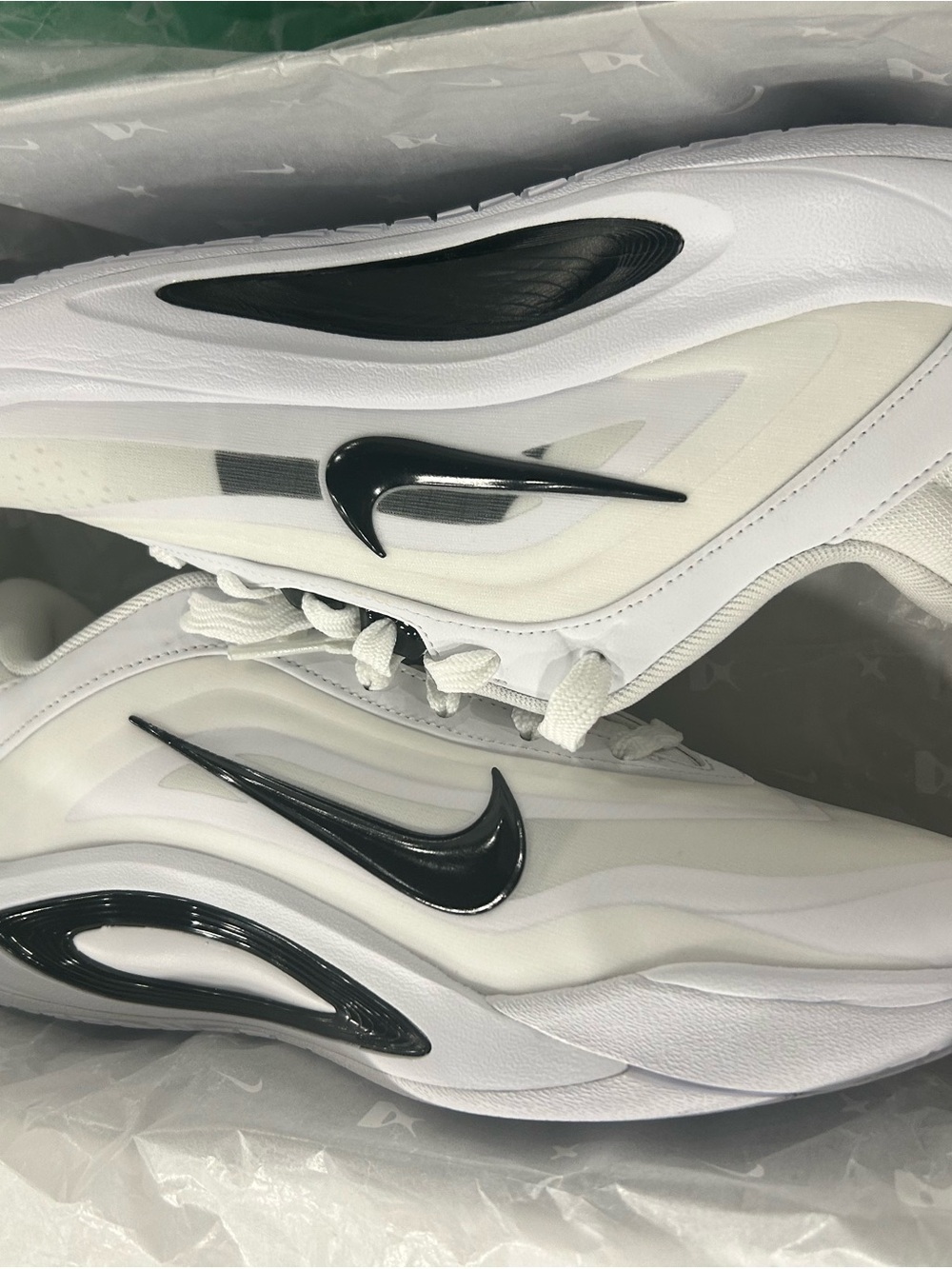 Nike Kids White Sneakers with Black Swoosh Accent